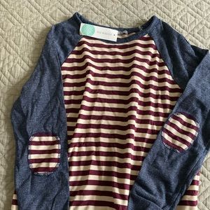 Red and pecan striped long-sleeved shirt.